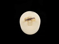 Anel ouro com zirconias castanhas